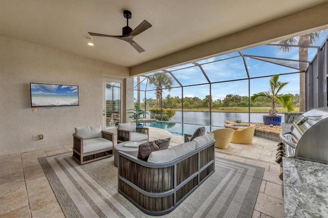 view of patio / terrace with glass enclosure, an outdoor kitchen, and an outdoor living space