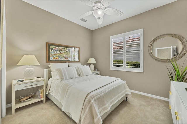 carpeted bedroom featuring ceiling fan