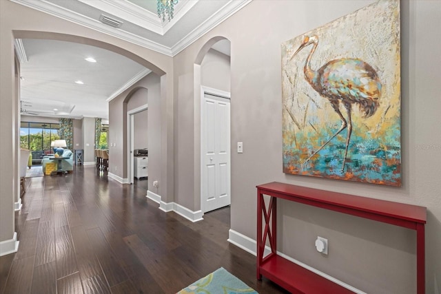 12606 Fontana Loop, Bradenton, FL 34211 - hallway featuring ornamental molding, arched walkways, wood finished floors, and recessed lighting