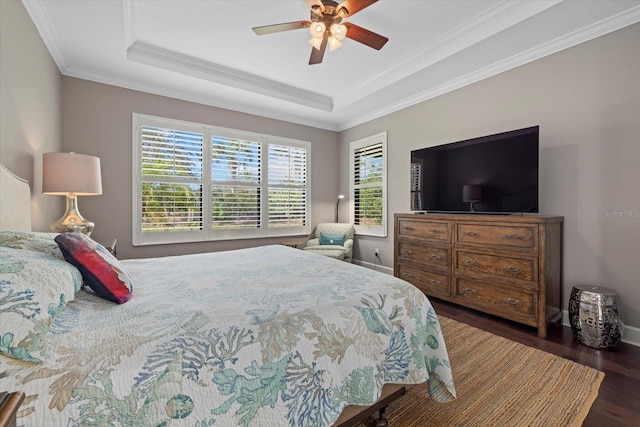 12606 Fontana Loop, Bradenton, FL 34211 - bedroom featuring a tray ceiling, ornamental molding, wood finished floors, and ceiling fan