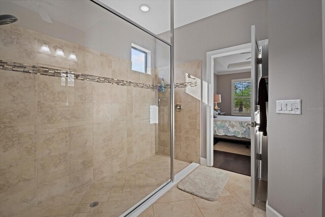 12606 Fontana Loop, Bradenton, FL 34211 - bathroom with ensuite bath, tiled shower, and tile patterned floors