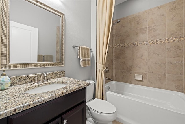 full bathroom featuring vanity, shower / bath combination with curtain, and toilet