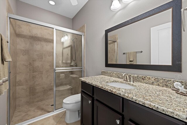 12606 Fontana Loop, Bradenton, FL 34211 - full bath with vanity, a stall shower, and tile patterned flooring
