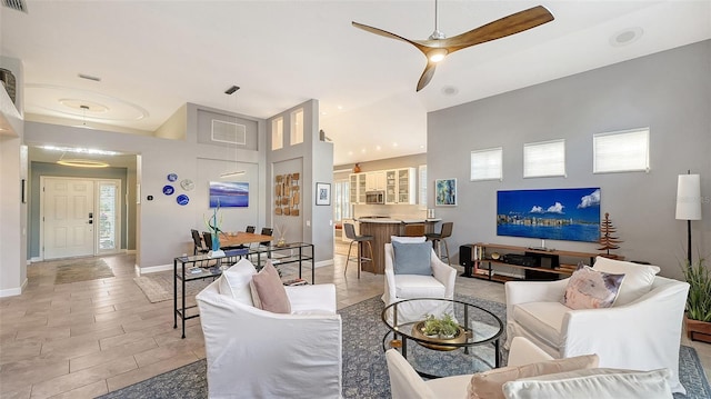 living room with ceiling fan