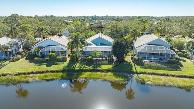 birds eye view of property featuring a water view