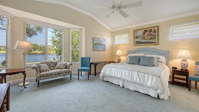 bedroom with multiple windows, ceiling fan, and vaulted ceiling