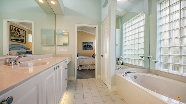 bathroom featuring a tub to relax in, tile patterned flooring, vanity, and vaulted ceiling