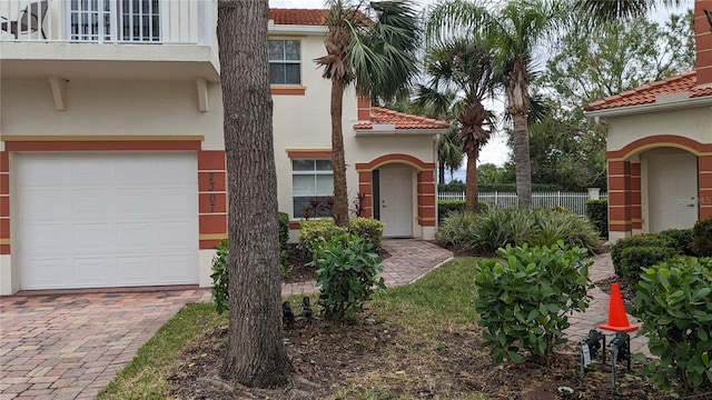 view of front of property with a garage