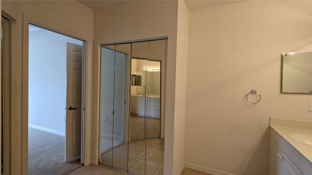 bathroom featuring tile patterned floors and vanity