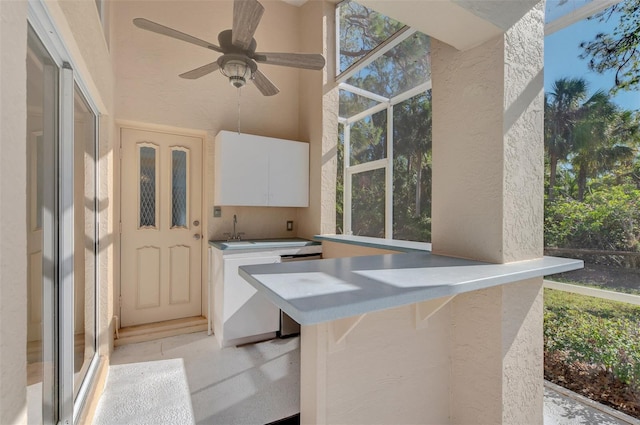 view of patio / terrace with ceiling fan