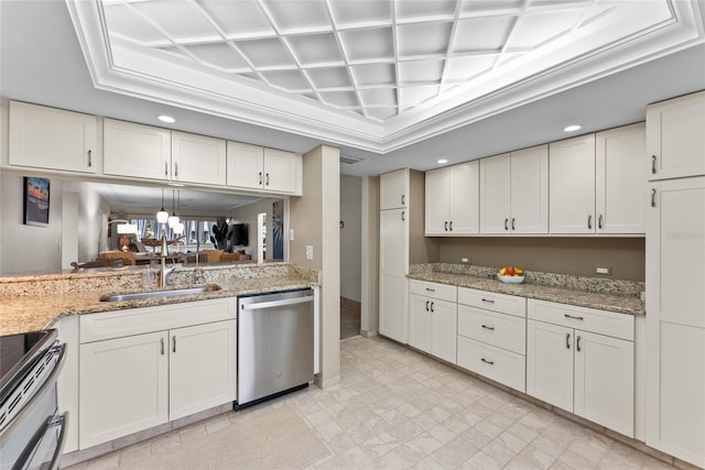 kitchen featuring white cabinetry, appliances with stainless steel finishes, ornamental molding, and sink