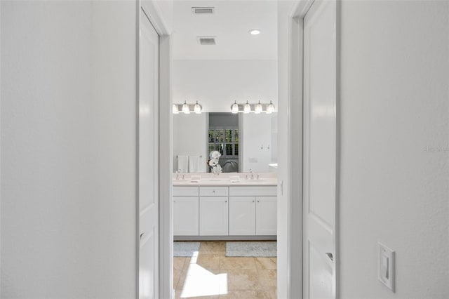 bathroom featuring vanity and tile patterned floors