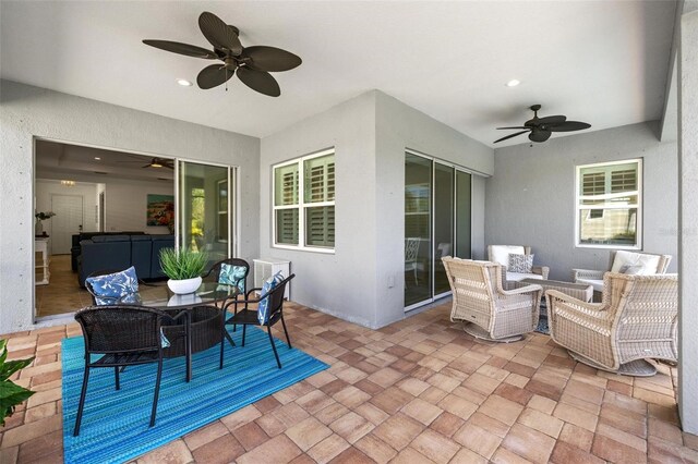 view of patio / terrace with an outdoor hangout area and ceiling fan