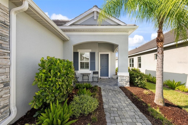 property entrance with a porch