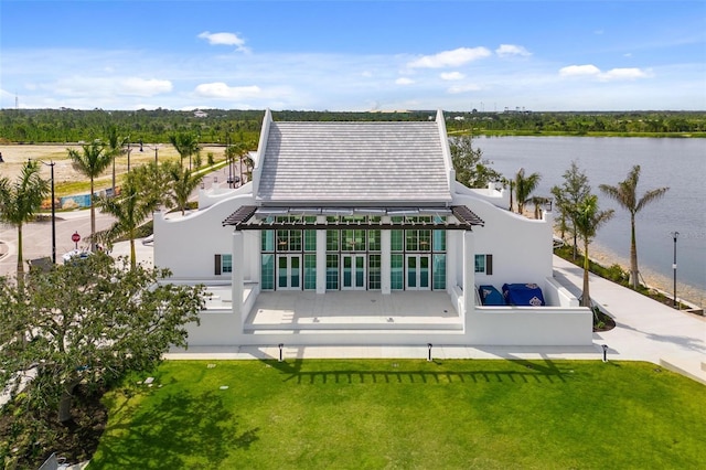 drone / aerial view featuring a water view