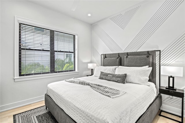 bedroom featuring light hardwood / wood-style flooring