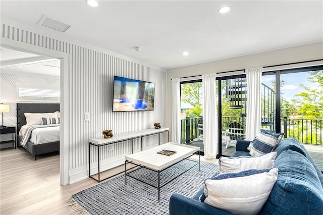 living room with light hardwood / wood-style flooring