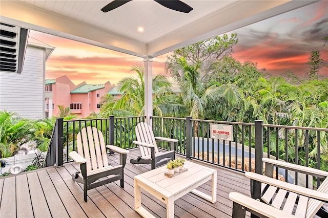 deck at dusk with ceiling fan