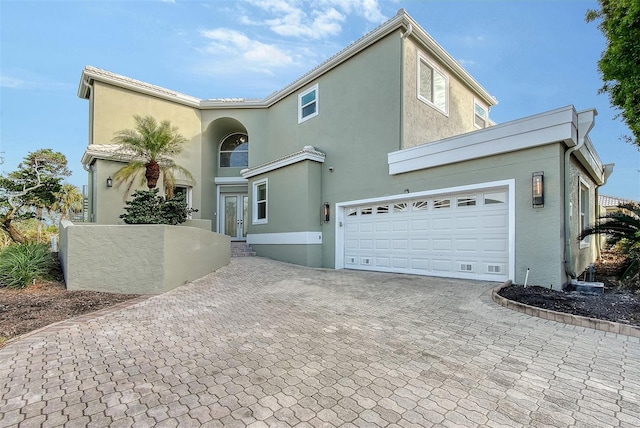 view of front of property featuring a garage