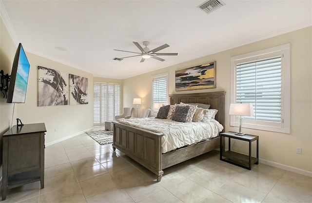 bedroom featuring ceiling fan, crown molding, and light tile patterned floors