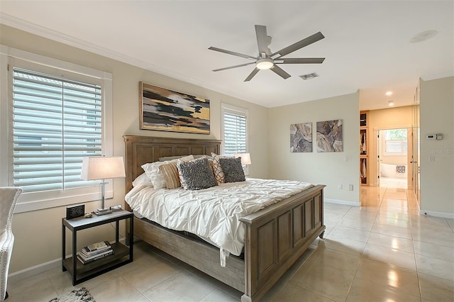 tiled bedroom with ceiling fan and ornamental molding