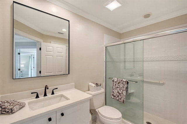 bathroom with walk in shower, crown molding, vanity, and toilet