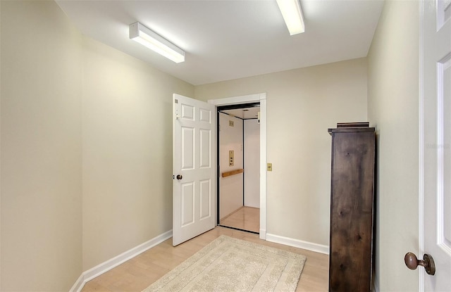 unfurnished room featuring light hardwood / wood-style flooring