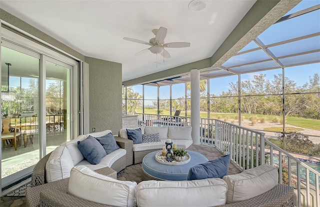 sunroom / solarium with ceiling fan