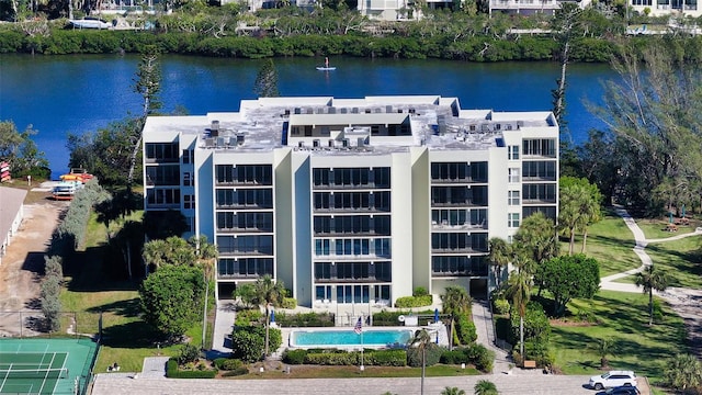 view of property with a water view