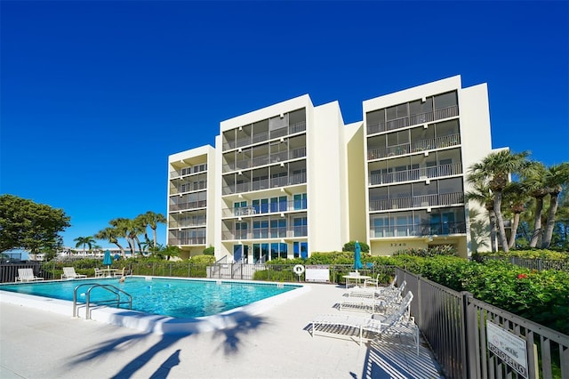 view of pool featuring a patio