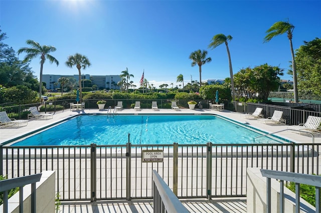 view of swimming pool with a patio