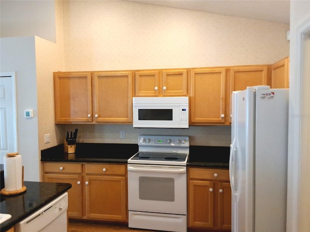 5115 44th St W, Bradenton, FL 34210 - kitchen with white appliances and dark stone counters
