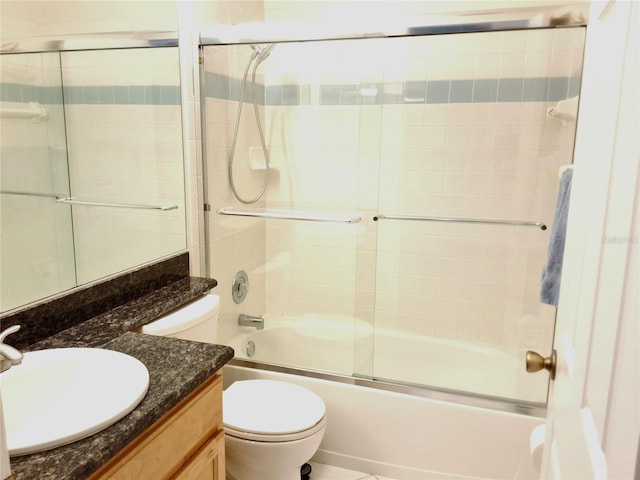5115 44th St W, Bradenton, FL 34210 - full bathroom featuring toilet, vanity, and combined bath / shower with glass door