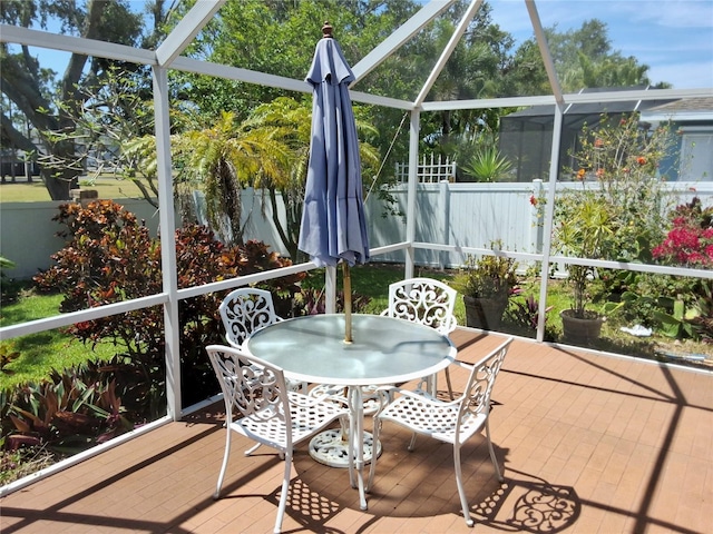 5115 44th St W, Bradenton, FL 34210 - sunroom / solarium featuring outdoor dining space