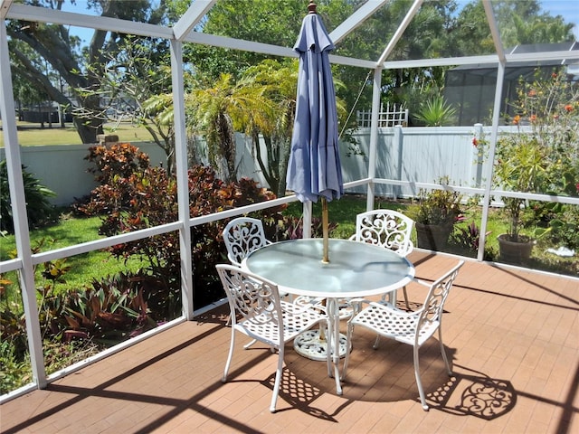 5115 44th St W, Bradenton, FL 34210 - sunroom / solarium featuring outdoor dining area