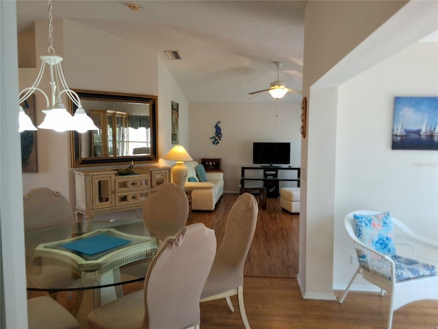 5115 44th St W, Bradenton, FL 34210 - dining area with baseboards, visible vents, lofted ceiling, wood finished floors, and ceiling fan
