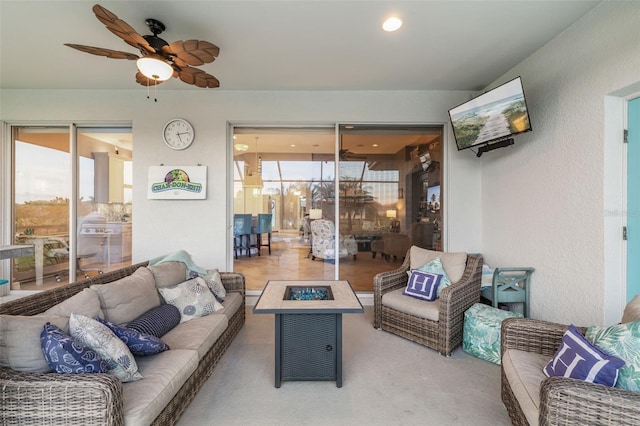 living room featuring ceiling fan