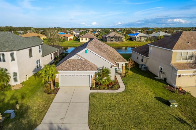 aerial view featuring a water view