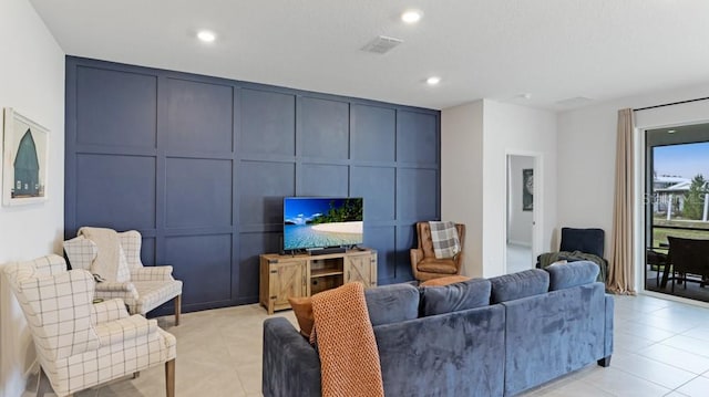 living room featuring light tile patterned flooring