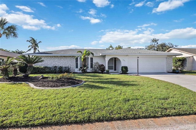 single story home with a front lawn and a garage