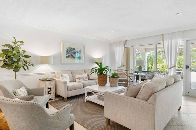 tiled living room featuring ornamental molding and a textured ceiling