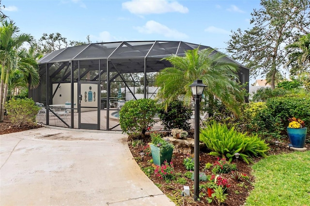 view of patio / terrace with glass enclosure