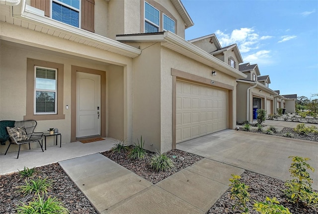 property entrance featuring a garage