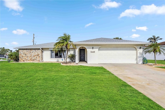 single story home with a front yard and a garage