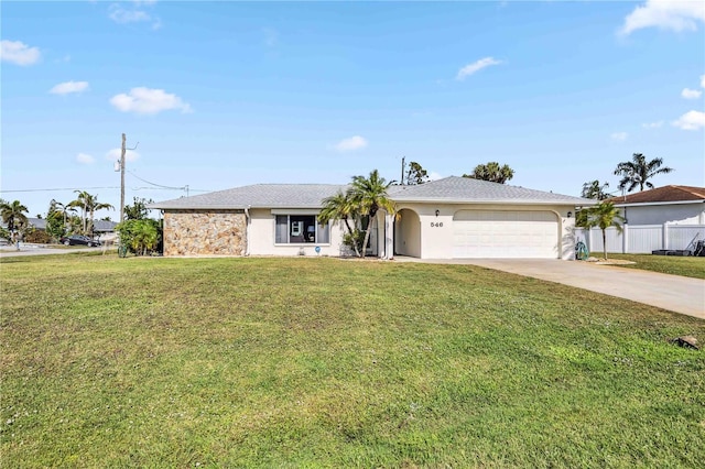 ranch-style home featuring a front lawn and a garage