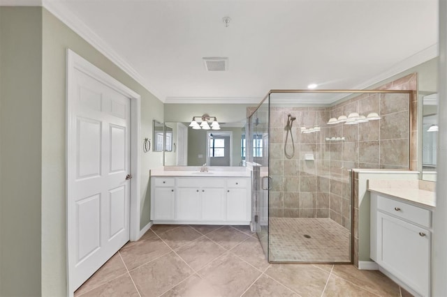 bathroom featuring crown molding, tile patterned floors, vanity, and a shower with door