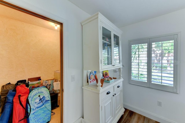 interior space with dark hardwood / wood-style flooring