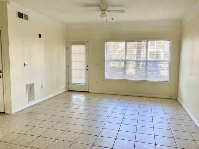 tiled empty room with ceiling fan