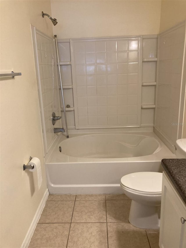 full bathroom featuring tile patterned floors, washtub / shower combination, vanity, and toilet