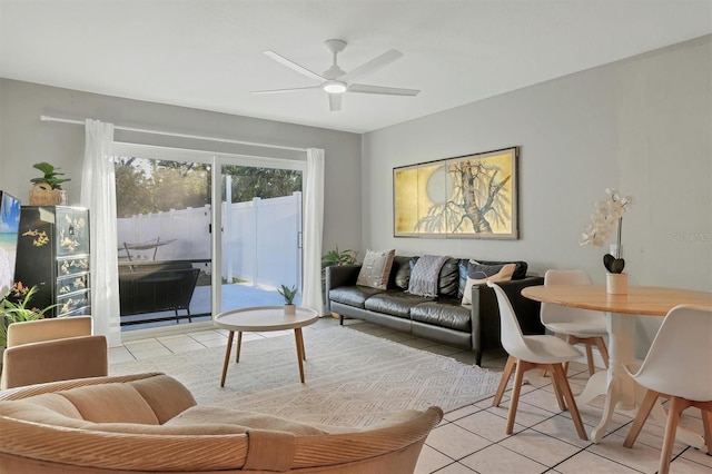 tiled living room with ceiling fan